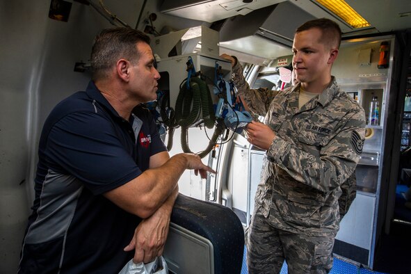 U.S. Air Force Tech. Sgt. Joseph P. Bodd, 514th Air Mobility Wing, answers an employer’s questions during the 514th’s Employer Appreciation Day at Joint Base McGuire-Dix-Lakehurst, N.J., Sept. 15, 2018. The event, which included flying in a C-17 Globemaster III, was designed to show the employers what their employees do when they are serving with the 514th. The 514th is an Air Force Reserve Command Unit. (U.S. Air Force photo by Master Sgt. Mark C. Olsen)