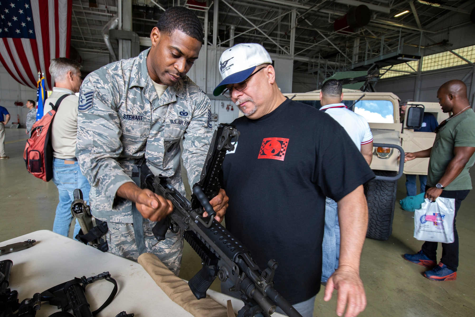 U.S. Air Force Tech. Sgt. Devonte J. Stewart, 514th Security Force Squadron, 514th Air Mobility Wing, gives a demonstration during the 514th’s Employer Appreciation Day at Joint Base McGuire-Dix-Lakehurst, N.J., Sept. 15, 2018. The event, which included flying in a C-17 Globemaster III, was designed to show the employers what their employees do when they are serving with the 514th. The 514th is an Air Force Reserve Command Unit. (U.S. Air Force photo by Master Sgt. Mark C. Olsen)