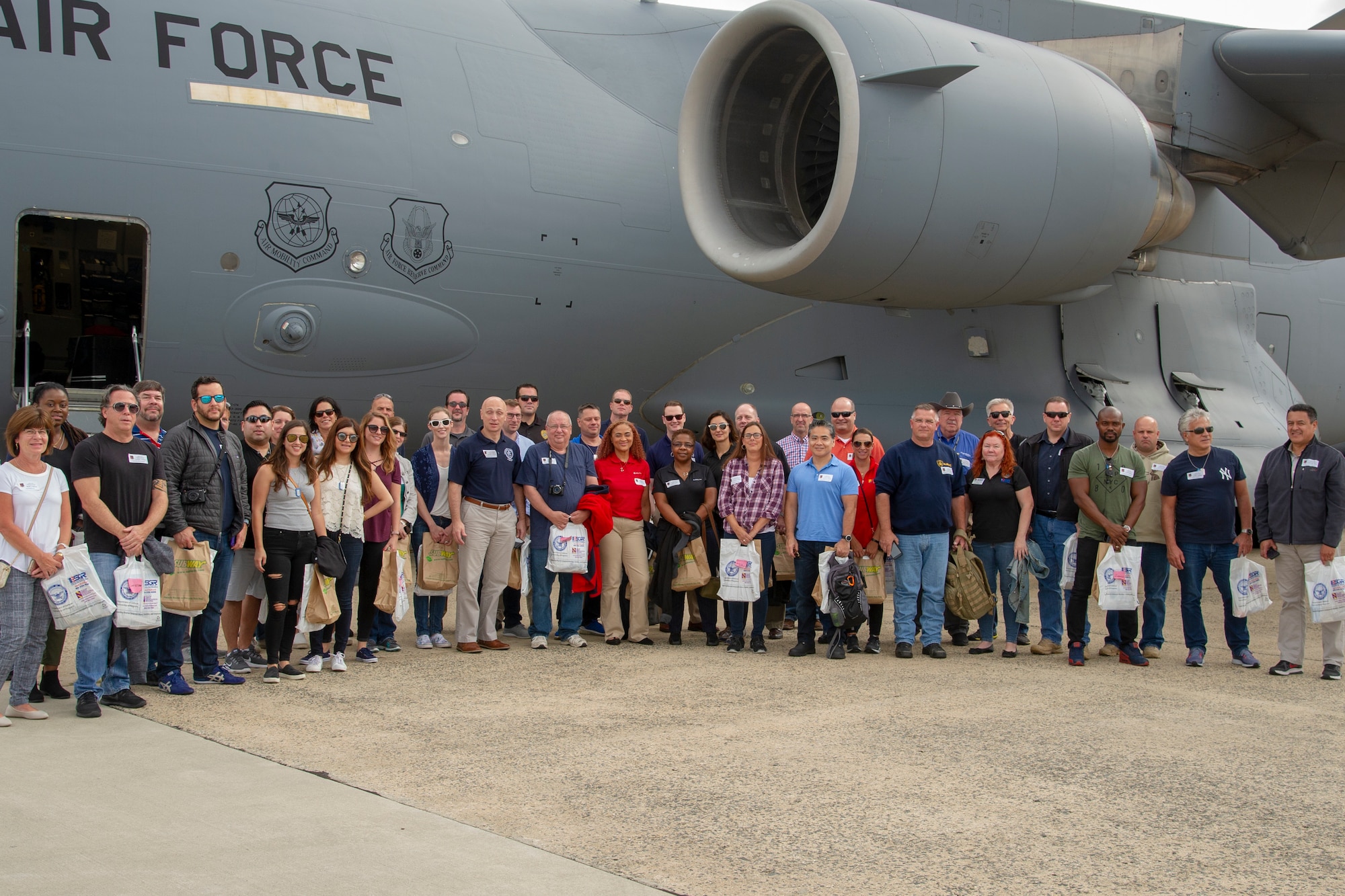 514th Air Mobility Wing employers return from a local flight  in a C-17 Globemaster III during the 514th’s Employer Appreciation Day at Joint Base McGuire-Dix-Lakehurst, N.J., Sept. 15, 2018. The event was designed to show the employers what their employees do when they are serving with the 514th. The 514th is an Air Force Reserve Command Unit. (U.S. Air Force photo by 1st Lt. Emily Rautenberg)