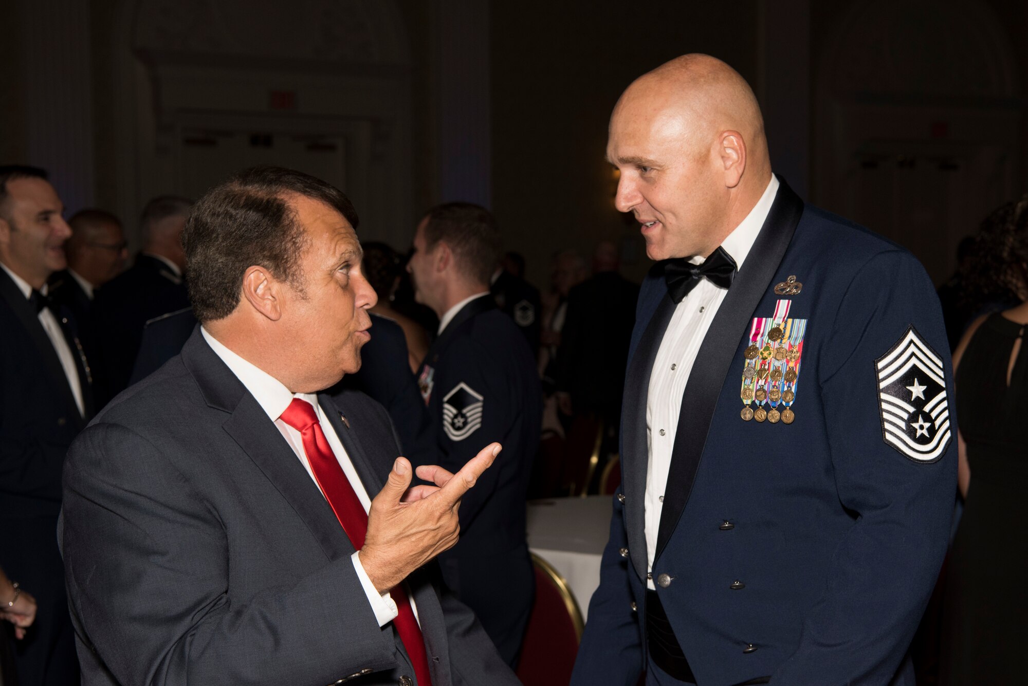 Dover Mayor Robin Christensen speaks with Chief Master Sgt. Anthony Green, 436th Airlift Wing command chief, during the Air Force Ball Sept. 15, 2018, in Dover, Del. Airmen from all ranks, their families and key members of the community came together during the ball to celebrate the Air Force’s birthday. (U.S. Air Force photo by Staff Sgt. Aaron J. Jenne)