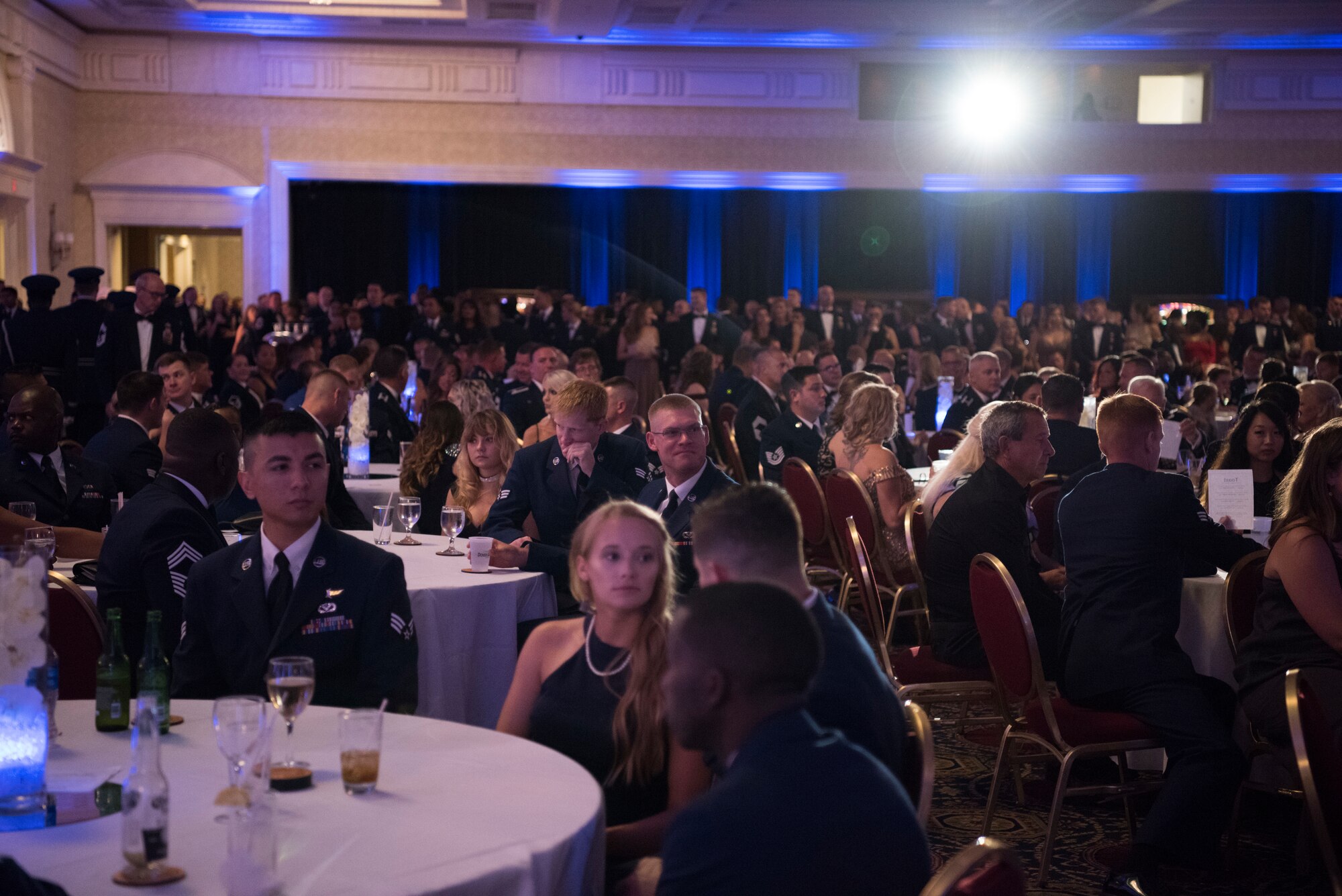 Attendees listen to a message about the importance of innovation and Airpower during the Air Force Ball Sept. 15, 2018, in Dover, Del. The event’s theme, “Eve of Tomorrow,” celebrated the 71st birthday of the world’s greatest Air Force, encouraging participants to remember the heritage and look toward the future. (U.S. Air Force photo by Staff Sgt. Aaron J. Jenne)