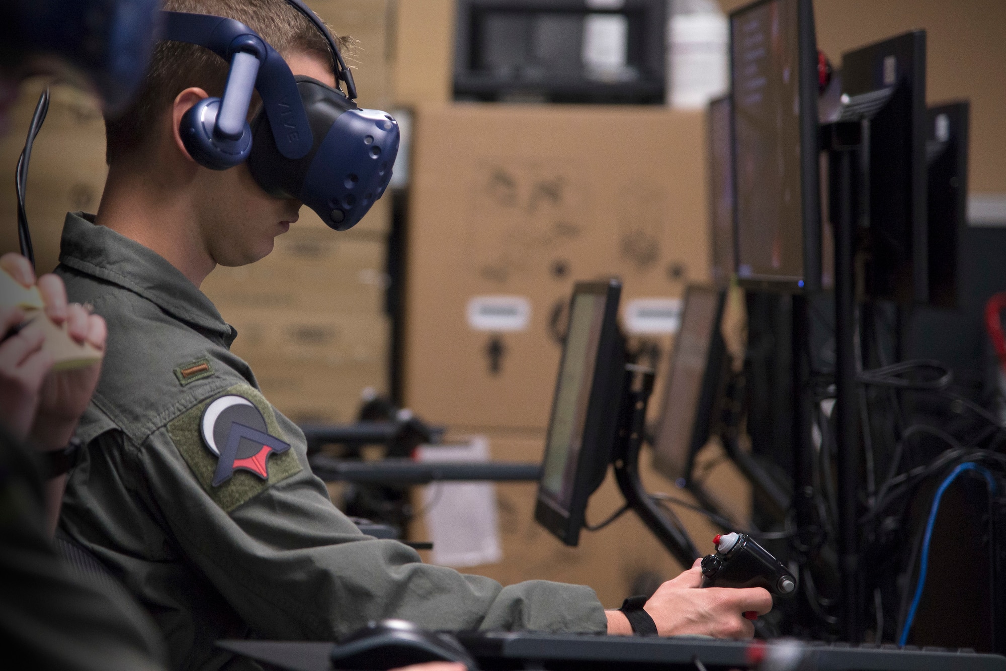 U.S. Air Force Second Lt. Austin Sneed, Pilot Training Next student, trains on a virtual reality flight simulator at the Armed Forces Reserve Center in Austin, Texas, June 18, 2018. Air Education and Training Command officials announced the second iteration of Pilot Training Next would begin in January 2019 during a panel at the 2018 Air Force Association Air, Space and Cyber Conference in National Harbor, Maryland. (U.S. Air Force photo by Sean M. Worrell)