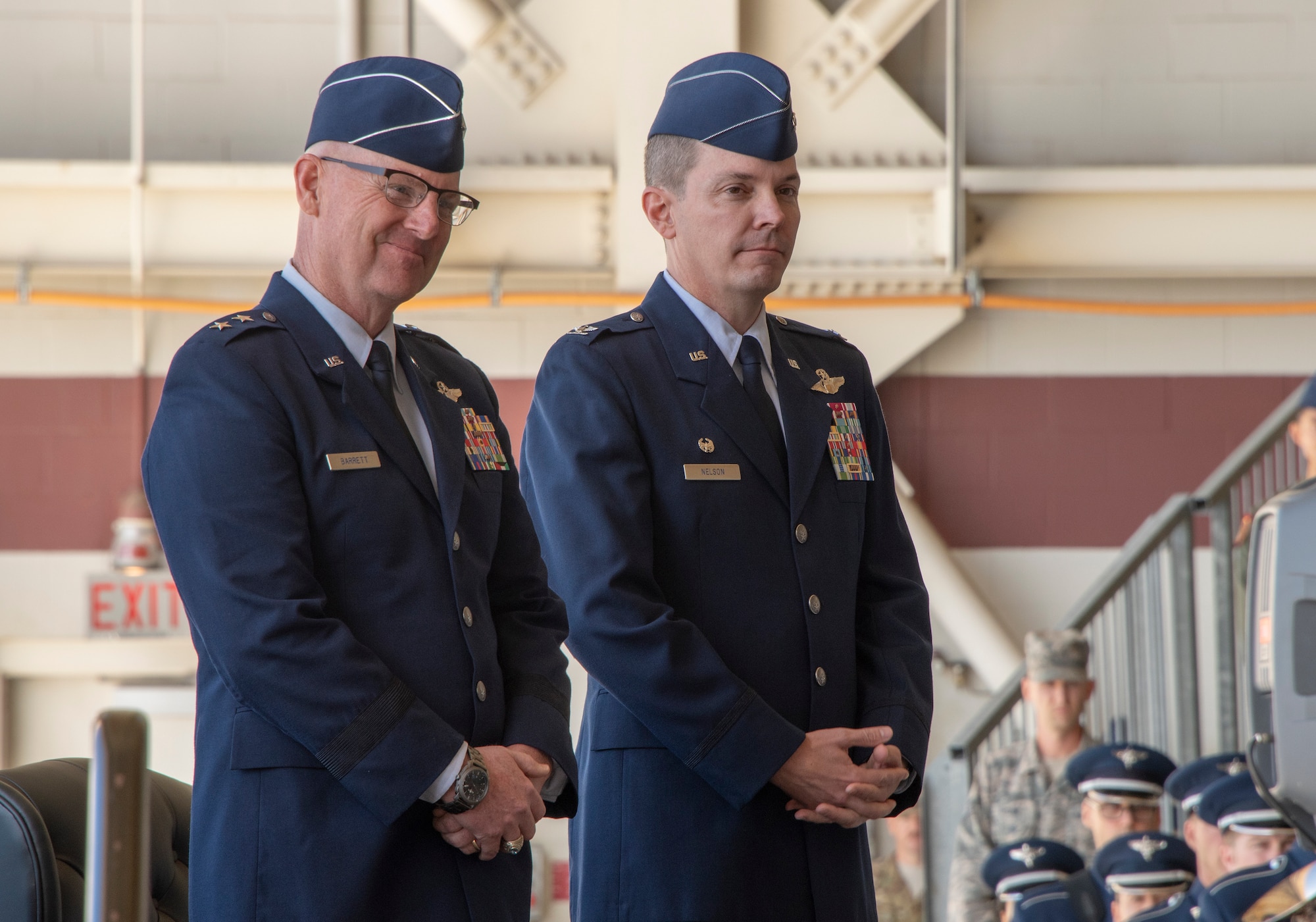 Maj. Gen. Sam Barrett (left), 18th Air Force commander, presides over the 60th Air Mobility Wing assumption of command ceremony at Travis Air Force Base, Calif., Sept. 18, 2018. Col. Jeff Nelson (right), assumed command of Air Mobility Command’s largest wing. (U.S. Air Force photo by Heide Couch)