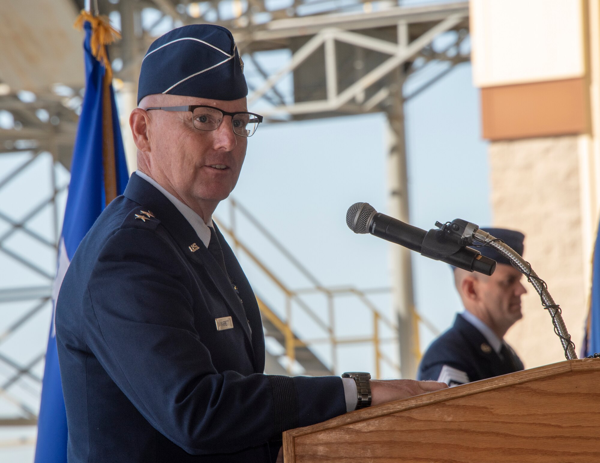 Maj. Gen. Sam Barrett, 18th Air Force commander, presides over the 60th Air Mobility Wing assumption of command ceremony at Travis Air Force Base, Calif., Sept. 18, 2018. During the ceremony, Col. Jeff Nelson, assumed command of Air Mobility Command’s largest wing. (U.S. Air Force photo by Heide Couch)