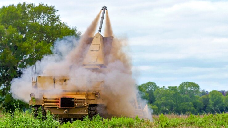 Soldiers launch a mine-clearing charge from an assault breacher vehicle