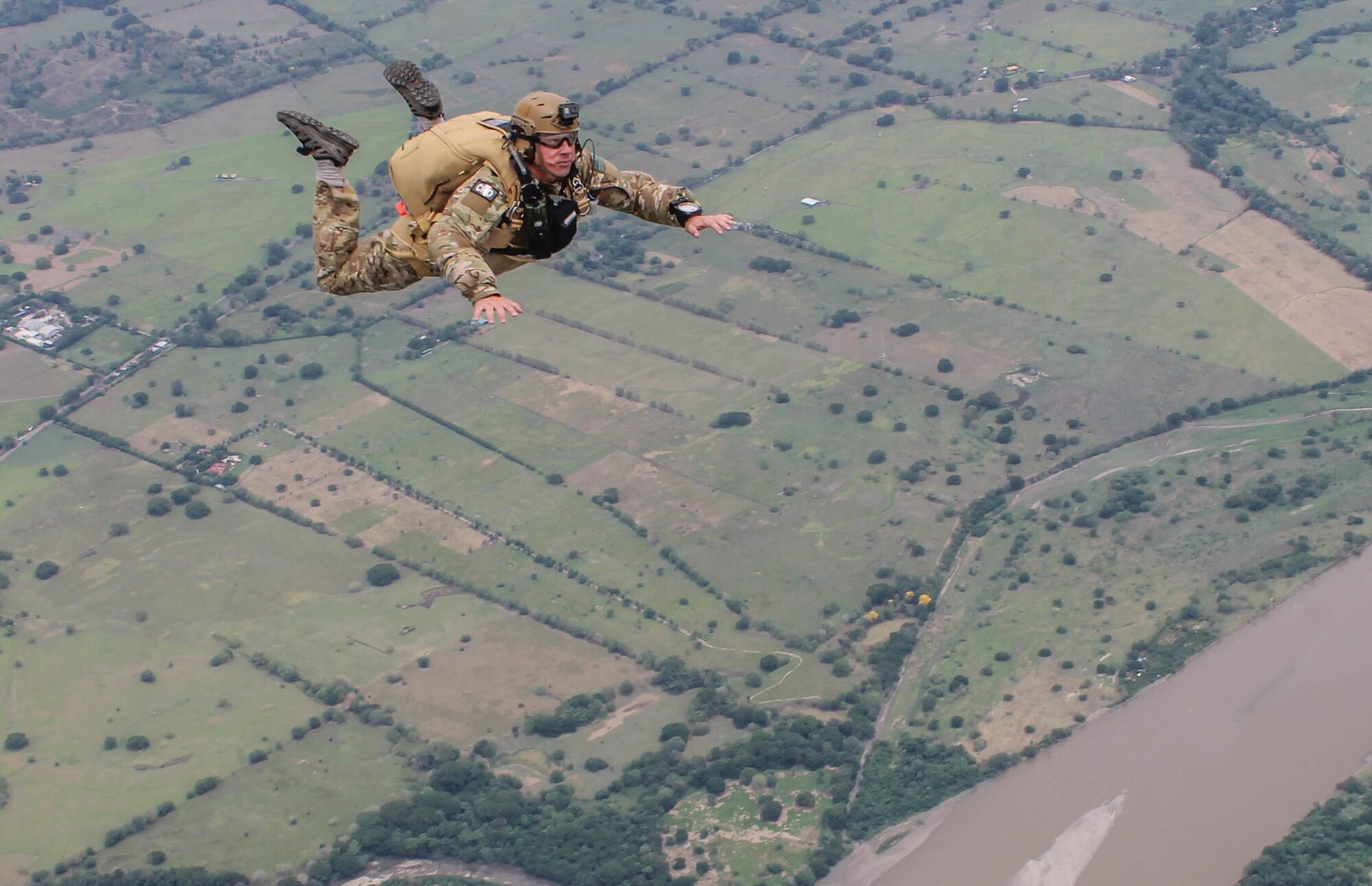 U.S. Air Force pararescuemen jump out of a Colombian Costa 295 aircraft during a multi-national jump with Colombian, Peruvian and Dominican special operations forces during exercise Angel de los Andes, Sept. 4, 2018. Angel de los Andes is a search and rescue exercise hosted by Colombia involving 12 partner nations working together in a multi-national environment and focuses on exercising search and rescue, aeromedical evacuation and casualty evacuation operations. (Courtesy Photo)