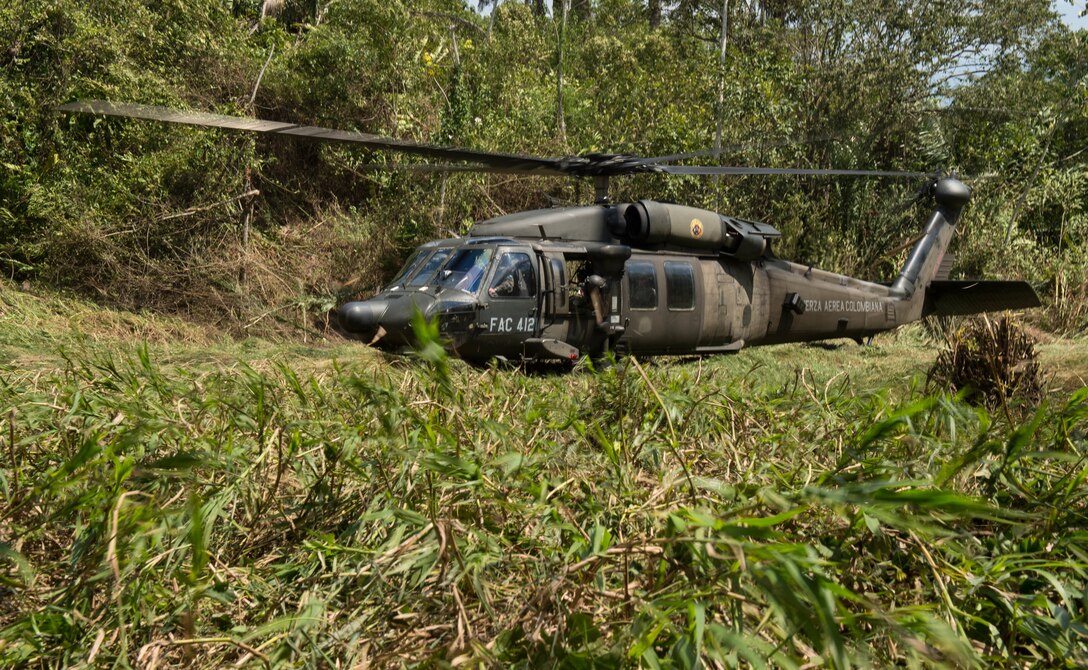 A Colombian UH-60 Blackhawk lands during the multinational exercise Angel de los Andes Sept. 5, 2018 at German Olano Air Base, Colombia. Angel de los Andes is a search and rescue exercise hosted by Colombia involving 12 partner nations working together in a multi-national environment and focuses on exercising search and rescue, aeromedical evacuation and casualty evacuation operations. (U.S. Air Force photo by Staff Sgt. Robert Hicks)