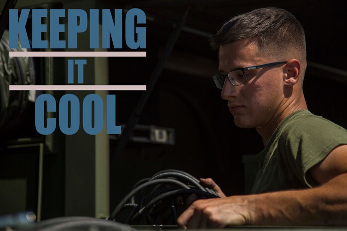 Pfc. Max Hulsey tests the operations of an environmental control unit (ECU) Sept. 17, 2018 at Camp Kinser, Okinawa, Japan. ECUs are serviced in and out of use to ensure they run properly when deployed. Hulsey, a native of Poulsbo, Washington, is a basic refrigeration and air conditioning technician with Electronic Maintenance Company, Maintenance Battalion, Combat Logistics Regiment 35. (U.S. Marine Corps photo by Lance Cpl. Jamin M. Powell)