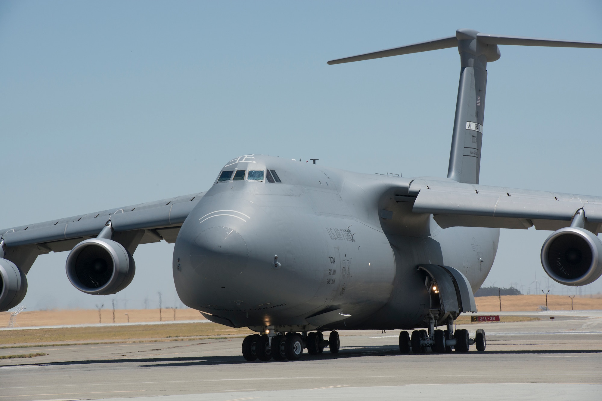 A C-5 M Super Galaxy on the ramp at Travis AFB, Calif., July 28, 2015. As the Air Force’s largest and only strategic airlifter, the C-5M Super Galaxy can carry more cargo farther distances than any other aircraft. This C-5M Super Galaxy is an upgraded version with new engines and modernized avionics designed to extend its service life beyond 2040. (U.S. Air Force Photograph/Heide Couch)