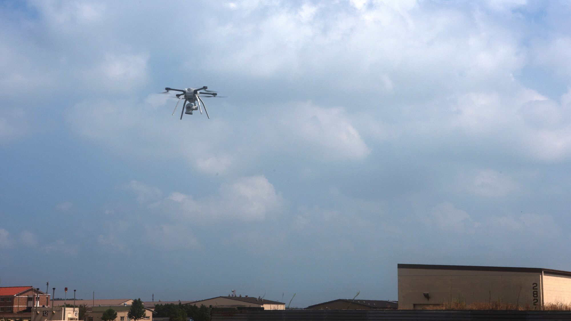 The 8th Civil Engineer Squadron launches the Aeryon SkyRanger drone to perform the Air Force’s first-ever operational rapid airfield damage assessment at Kunsan Air Base, Republic of Korea, Aug. 13, 2018. The 8th CES is the first in the Air Force to operationally fly drones to perform airfield surveys to give commanders real-time information about airfield conditions. (U.S. Air Force photo by Staff Sgt. Levi Rowse)