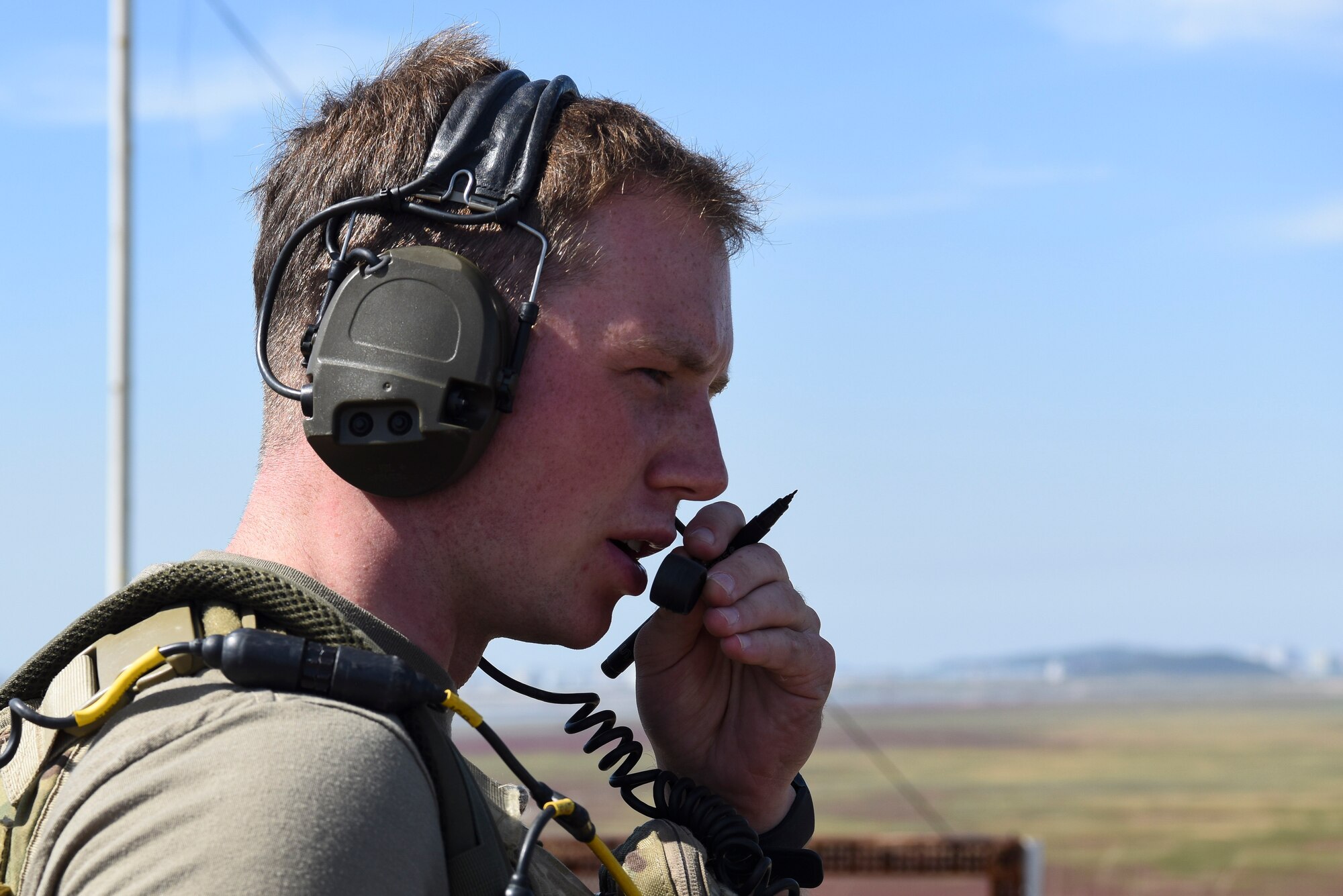 U.S. Air Force 1st Lt. Clay West, air liaison officer from the 15th Air Support Operations Squadron, Fort Stewart, Georgia, communicates with an F-16 Fighting Falcon pilot over the radio Sept. 12, 2018 at Kunsan Air Base, Republic of Korea. One of the joint terminal attack controller training objectives was for all targets to be struck within a designated timeframe after  target nomination. (U.S. Air Force photo by Senior Airman Savannah L. Waters)