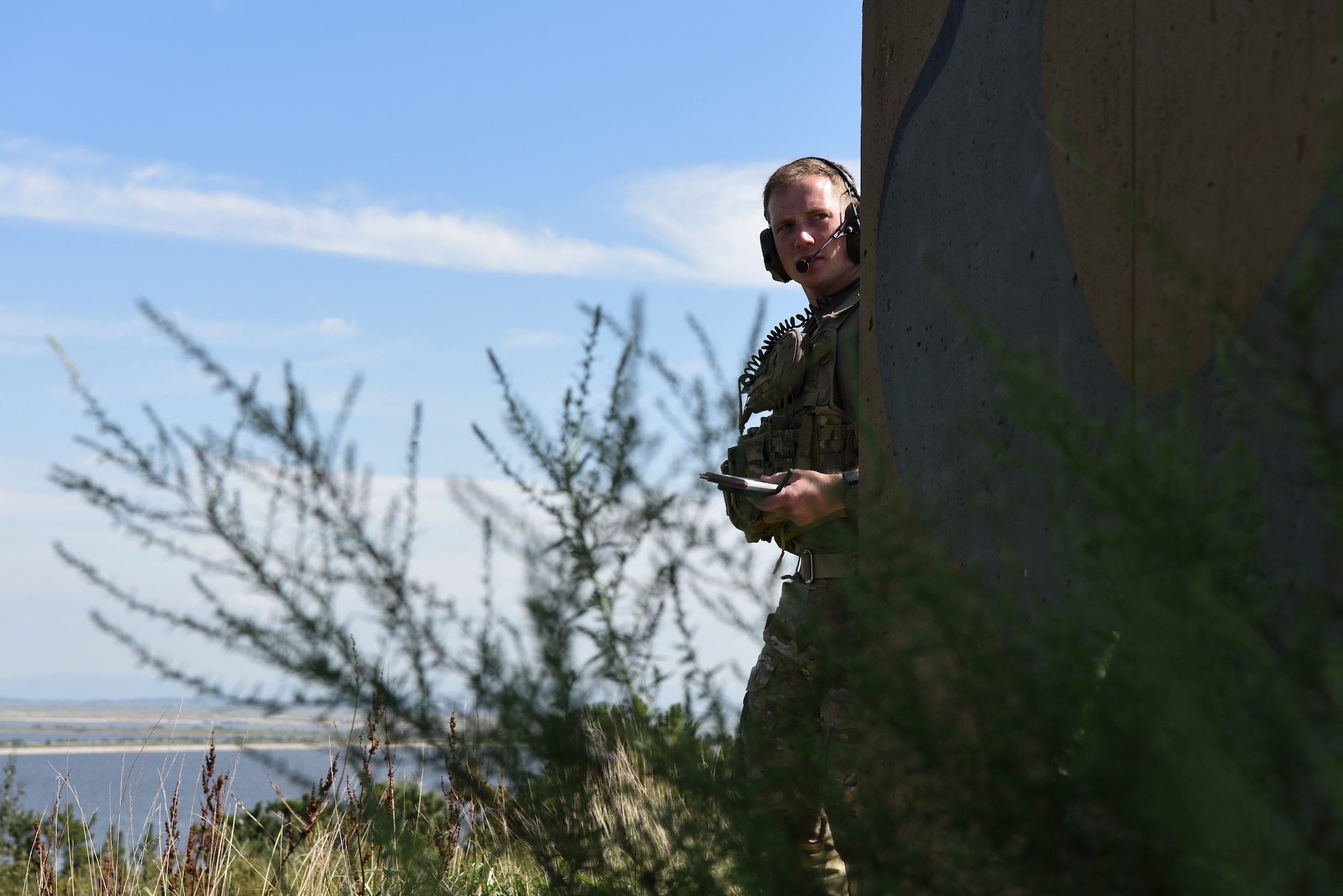 U.S. Air Force 1st Lt. Clay West, air liaison officer from the 15th Air Support Operations Squadron, Fort Stewart, Georgia, watches for an F-16 Fighting Falcon Sept. 12, 2018 at Kunsan Air Base, Republic of Korea. The joint terminal attack controller training integrated real world joint fires observers into a scenario with three-way communication maintained throughout the mission. (U.S. Air Force photo by Senior Airman Savannah L. Waters)