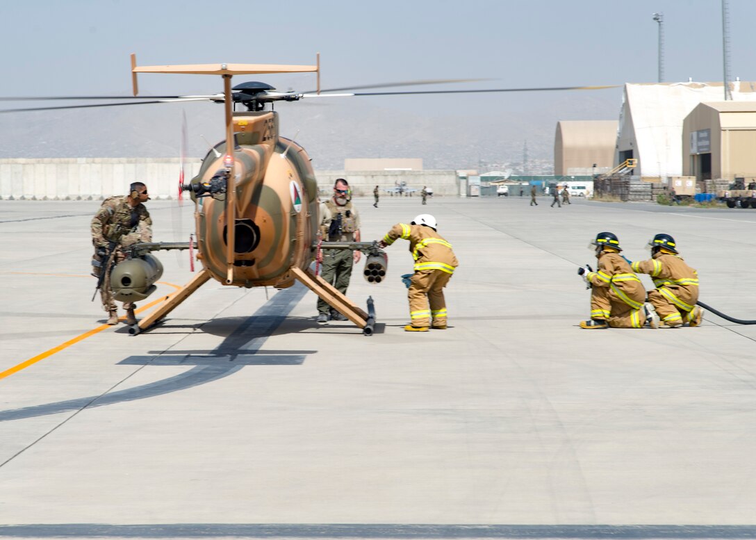 AAF Firefighters Conduct MD-530 Egress training