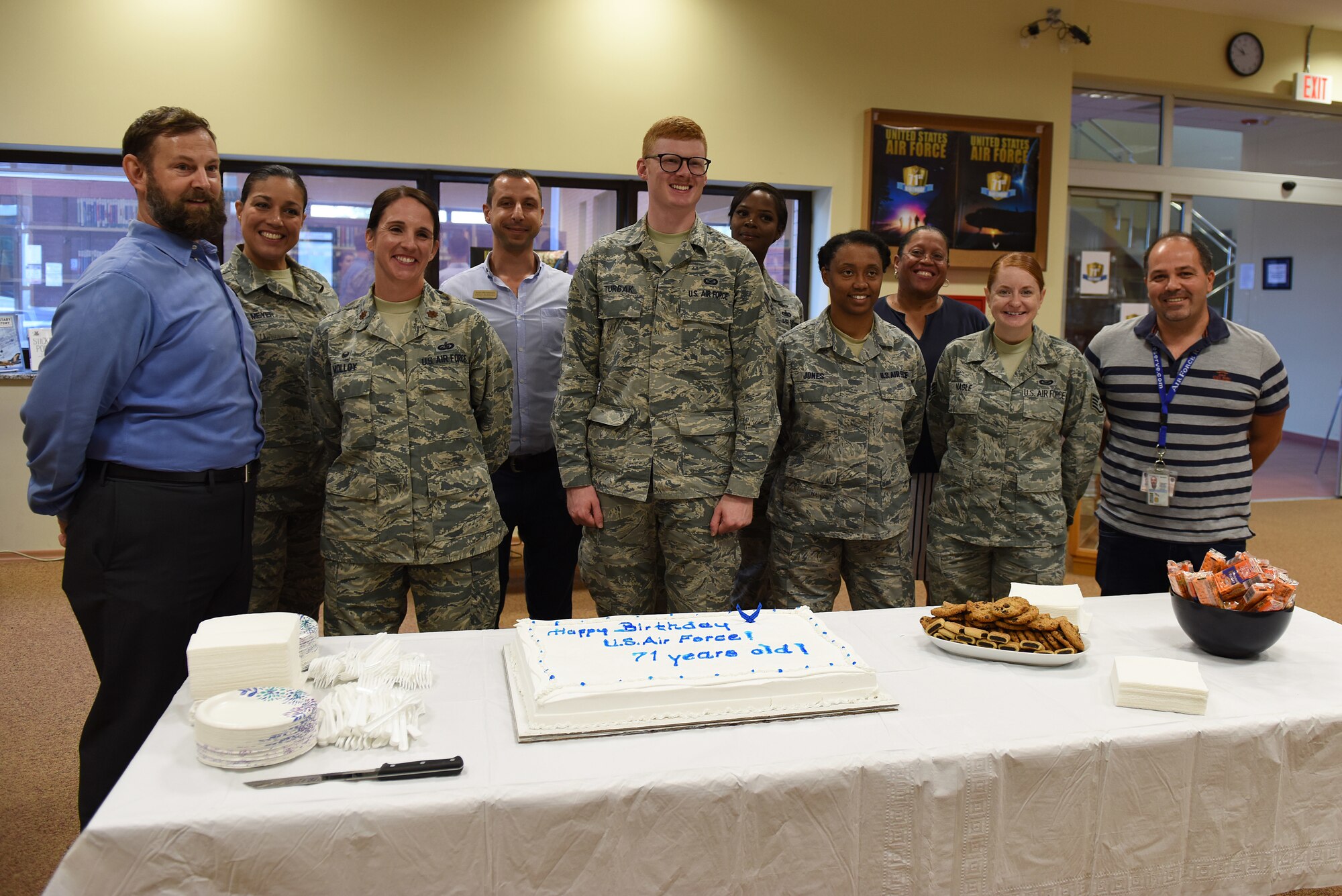 U.S. Air Force Airmen and Local Nationals pose for a picture during the U.S. Air Force’s 71st Birthday celebration at Incirlik Air Base, Turkey, Sept. 18, 2018.