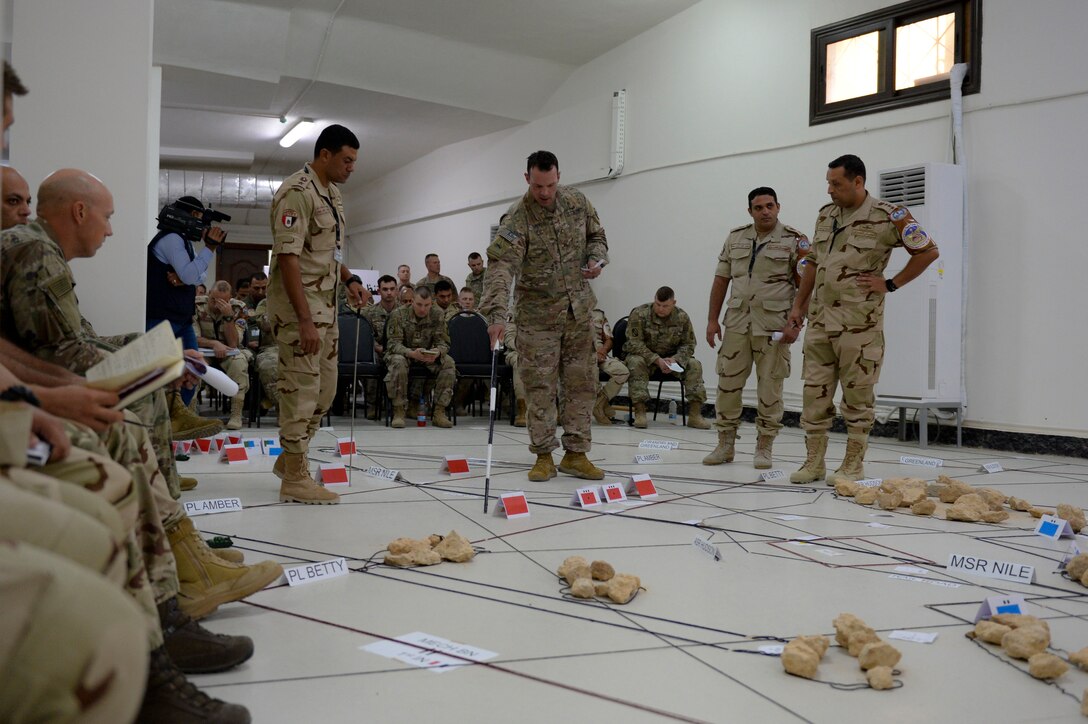 U.S. and Egyptian military leaders plan strategy during the Bright Star 2018 command post exercise at Mohamed Naguib Military Base, Egypt, Sept. 8, 2018. During the CPX, U.S., Egyptian and partner-nation forces trained together for real-world events by addressing a simulated adversary and relevant challenges in a coalition environment. (U.S. Air Force photo by Senior Airman Dawn M. Weber)