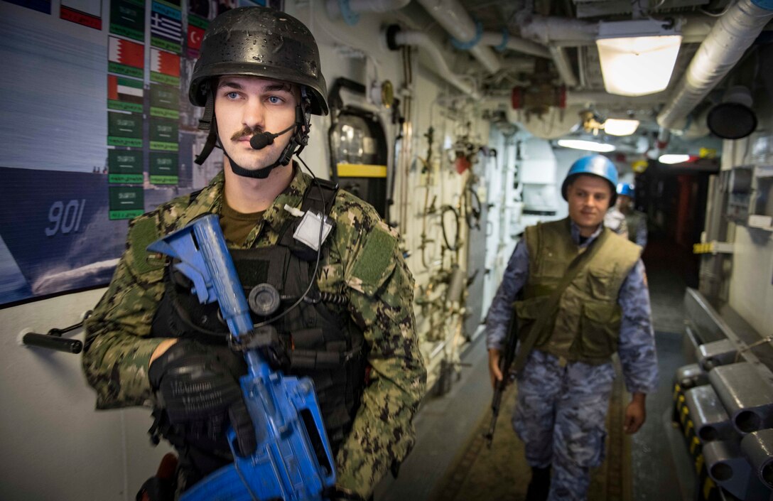 Fire Controlman 2nd Class Nathan Medich, assigned to the Arleigh Burke-class guided-missile destroyer USS Carney (DDG 64), participates in visit, board, search and seizure (VBSS) training aboard the Egyptian Naval Force guided-missile frigate Sharm El-Sheikh (FFG 901) during Exercise Bright Star 2018. Bright Star is a multilateral U.S. Central Command exercise held with the Arab Republic of Egypt focused on responding to modern-day security scenarios. U.S. Navy and coalition assets are participating in numerous exercises, such as Bright Star, as part of the greater Theater Counter Mine and Maritime Security Exercise to ensure maritime stability and security in the Central Region, connecting the Mediterranean and Pacific through the western Indian Ocean and three strategic choke points. (U.S. Navy photo by Mass Communication Specialist 1st Class Ryan U. Kledzik/Released)