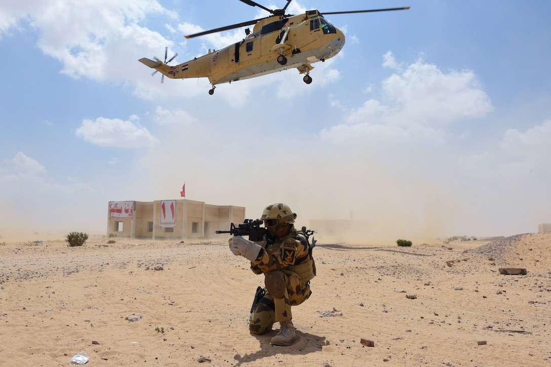 A Jordanian Special Operations Forces soldier provides security after repelling from an Egyptian helicopter during Military Operations in Urban Terrain training, which was part of Exercise Bright Star 2018 (BS 18) at Muhamed Naguib Military Base, Sept. 10, 2018. BS18 is a multi-lateral exercise to strengthen relationships with our Egyptian partners as well as a forum for addressing relevant regional issues associated with enhancing regional security and cooperation, promoting coalition interoperability in irregular warfare, and improving interoperability throughout the full range of military operations. (U.S. Air Force photo by Senior Airman Dawn M. Weber)