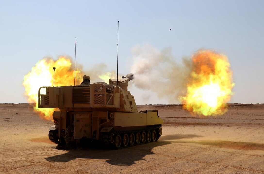 A M109 Paladin from Alpha Battery, 2nd Battalion, 114th Field Artillery Regiment, 155th Armored Brigade Combat Team, Task Force Spartan, fires a high explosive round during the Combined Arms Lived Fire Exercise, part of Bright Star 18. (U.S. Army photo by Staff Sgt. Matthew Keeler)