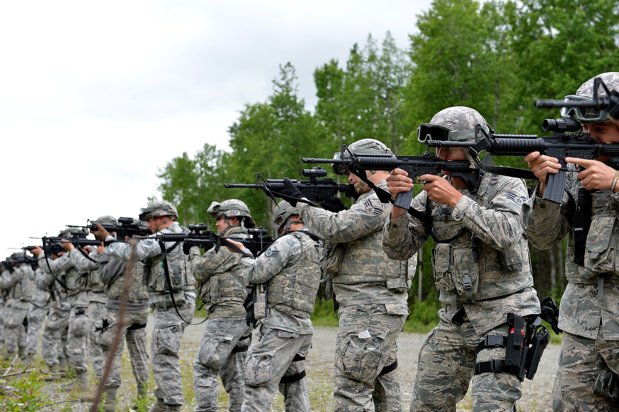 Airmen with the 155th Security Forces Squadron from the 155th Air Refueling Wing, Nebraska, test their weapons before a Shoot, Move, and Communicate exercise June 22, 2017, at Joint Base Elmendorf-Richardson, Alaska. 
 (U.S. Air Force photo taken by Airman 1st Class Jamie Titus/ Released)