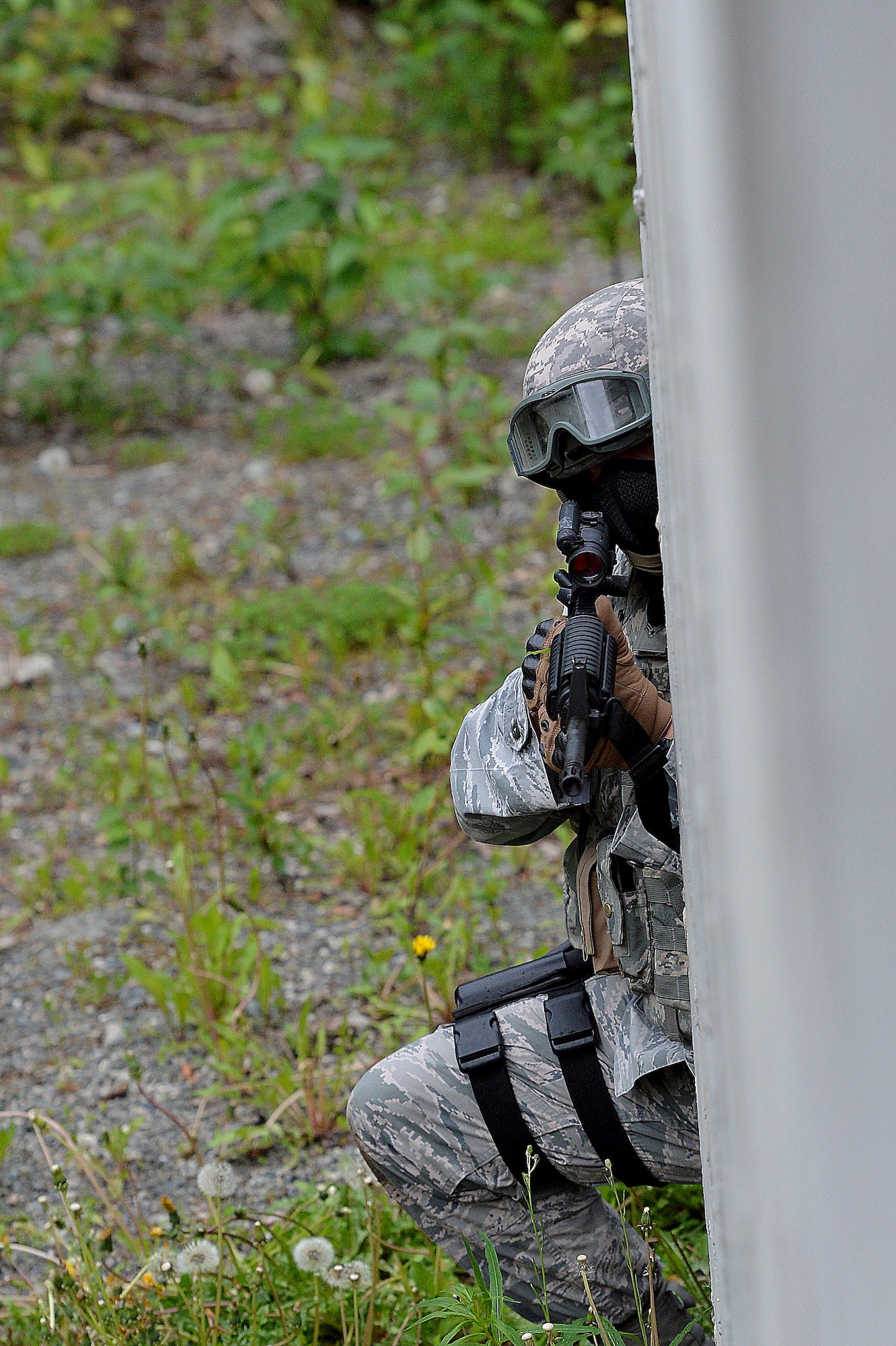 An Airman with the 155th Security Forces Squadron from the 155th Air Refueling Wing, Nebraska, take part in a Shoot, Move, and Communicate exercise June 22, 2017, at Joint Base Elmendorf-Richardson, Alaska. 
 (U.S. Air Force photo taken by Airman 1st Class Jamie Titus/ Released)