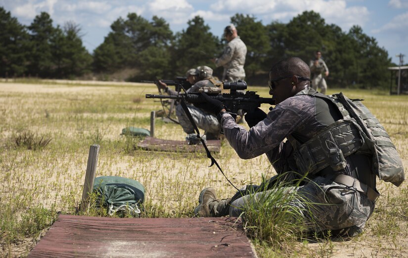 U.S. Air Force Staff Sgt. Zachary Everett, Dover Air Force Base, Del., 436th Security Forces Squadron response force leader, shoots an M4 carbine assault rifle during weapons training during preparation for representing Air Mobility Command in the 2018 Defender Challenge on Joint Base McGuire-Dix-Lakehurst, New Jersey, Sept. 4, 2018. The challenge reactivated after a 14-year hiatus due to mission requirements in the wake of 9/11. “I didn’t know what the competition was before,” said Everett. “It sounded extremely interesting, especially sense I would get to work with military services from other countries, so I jumped on the opportunity.” (U.S. Air Force photo by Airman Ariel Owings)