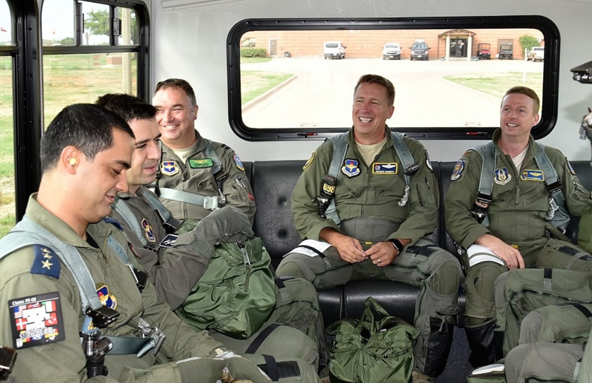 U.S. Air Force Maj. Gen. Patrick Doherty (center), 19th Air Force commander, joins members of the 459th and 89th Flying Training Squadrons before a tactical formation sortie during T-6 continuation training at Sheppard Air Force Base, Texas, Aug. 22, 2018. Doherty has made it a priority to visit all of the flying training wings to immerse Airmen in important issues pertaining to the Numbered Air Force. (Courtesy Photo)