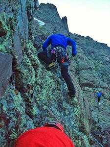 Civilian search-and-rescue personnel from Custer County Search & Rescue, Saguache County Search & Rescue, and Western Mountain Rescue Team, climb to reach Jennifer Tatnall Staufer, an experienced mountaineer who survived a 150-foot fall down Crestone Peak in the Sangre de Cristo Range in southern Colorado, July 11, 2015.