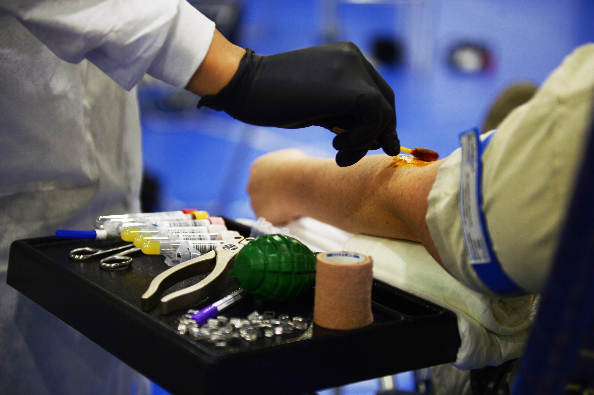 An Armed Services Blood Program team member prepares an Airman to donate blood during a blood drive at Royal Air Force Lakenheath, England, Sept. 18, 2018.  The two-day event allowed approximately 185 Airmen to donate blood. (U.S. Air Force photo/Airman 1st Class Shanice Williams-Jones)