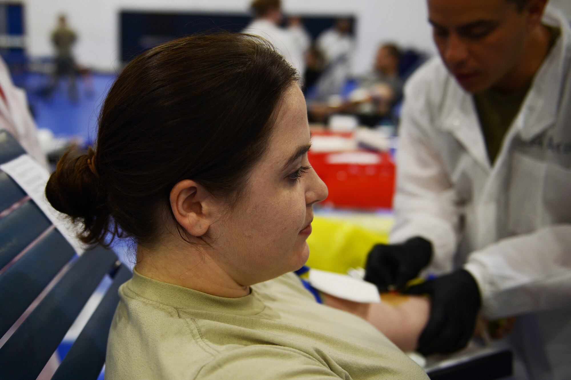 An Airman prepares to donate blood at a blood drive hosted by the Armed Services blood Program at Royal Air Force Lakenheath, England, Sept. 18, 2018. The two-day blood drive processed 99 bags of blood on the first day to be added to the ASBC-E for storage and distribution to fellow U.S. service members and dependents in need. (U.S. Air Force photo/Airman 1st Class Shanice Williams-Jones)