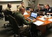 Maj. Ralph Bailey, a judge advocate from the 213th LOD, is assigned to review mission assignments from the regional Defense Coordinating Element.