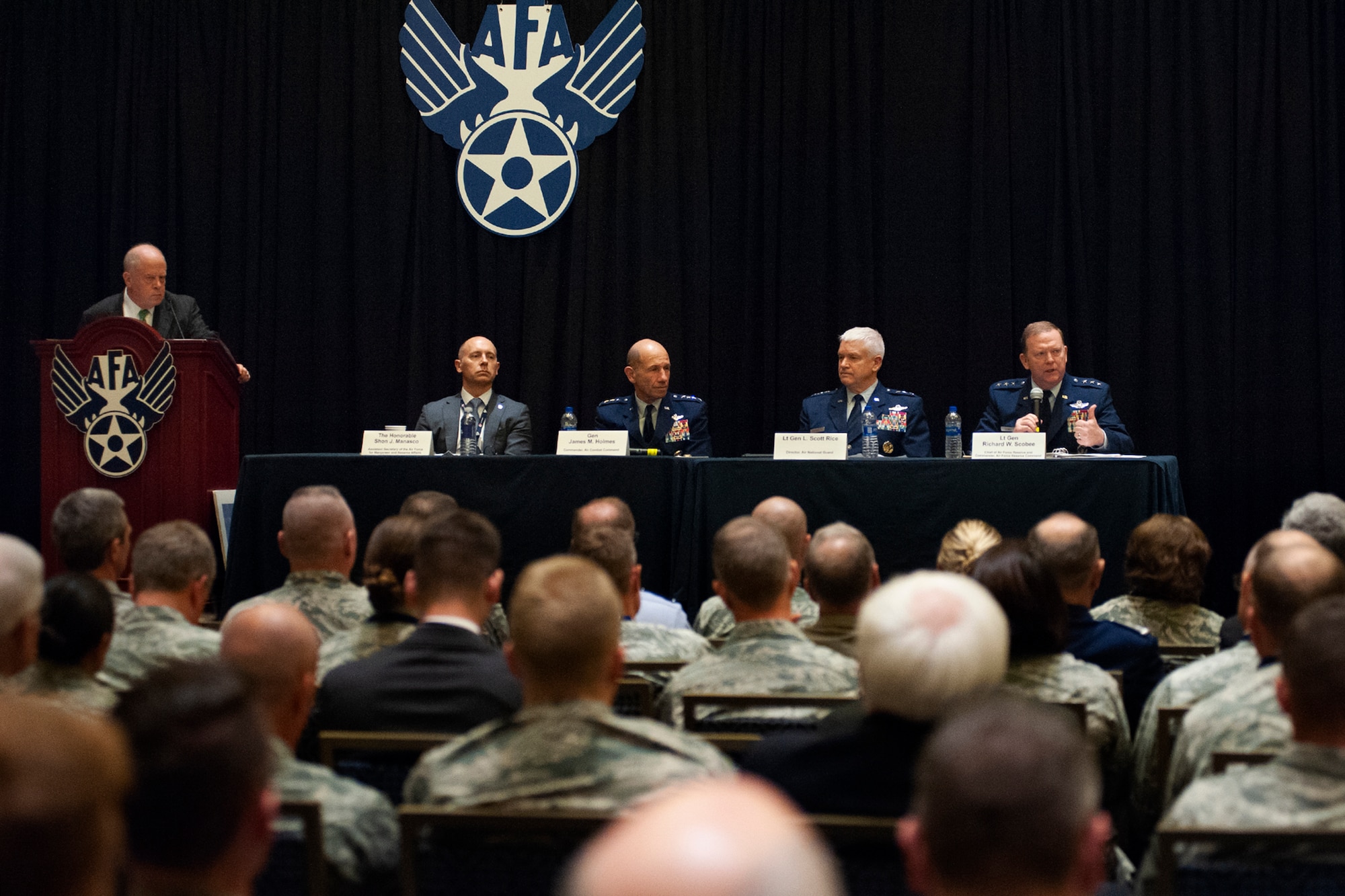 A panel consisting of (from left) Assistant Secretary of the Air Force for Manpower and Reserve Affairs, Shon J. Manasco, the Commander of Air Combat Command Gen. James M. Holmes, Director of the Air National Guard Lt. Gen. L. Scott Rice, and Chief of the Air Force Reserve and Commander Air Force Reserve Command Lt. Gen. Richard W. Scobee, participate in a total force integration panel during the Air Force Association Air, Space and Cyber Conference Sept. 18, 2018, in National Harbor, Md. The panel discussed ways to improve processes and better integrate Guard and Reserve Airmen into operations. (U.S. Air Force photo by Andy Moratay)