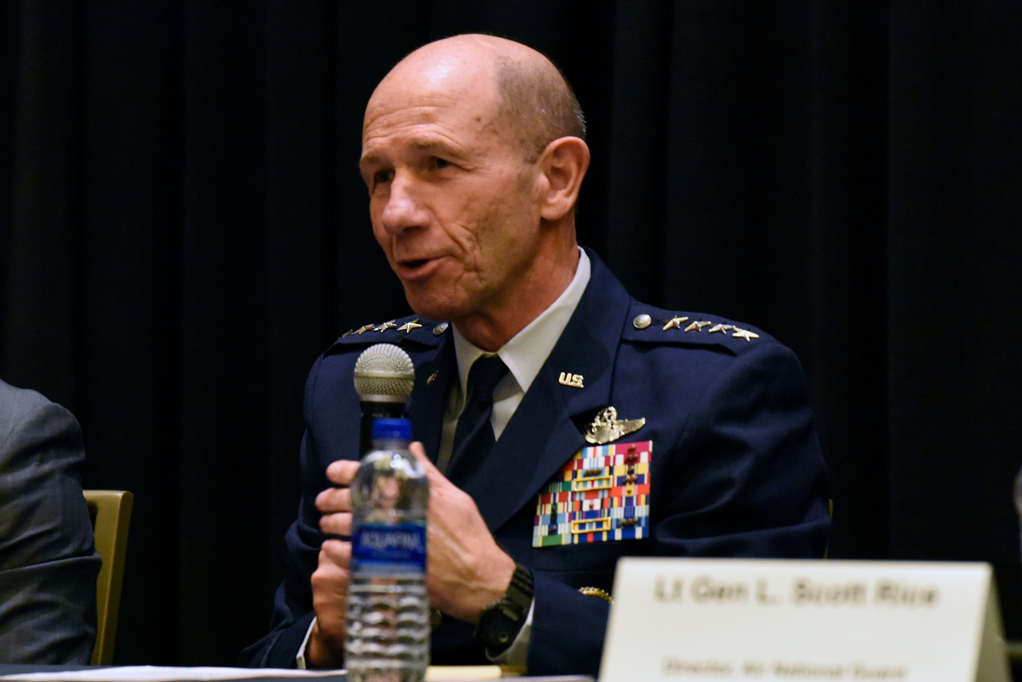 Gen. James M. Holmes, Air Combat Command commander, participates in a panel about the total force during the Air Force Association’s Air, Space and Cyber Conference Sept. 18, 2018, in National Harbor, Md. ASC18 is a professional development conference that offers an opportunity for Department of Defense personnel to participate in forums, speeches, seminars and workshops. (U.S. Air Force photo by Airman 1st Class Zoe M. Wockenfuss)