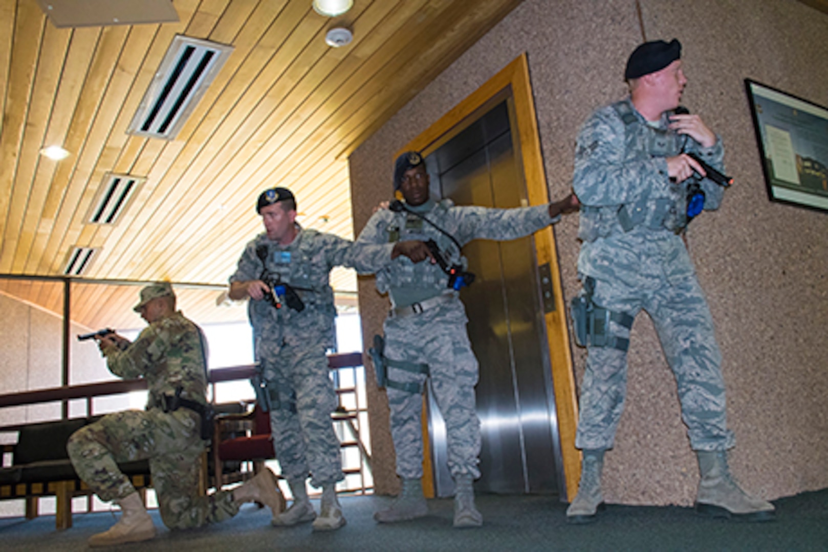 Members of the Colorado National Guard, South Metro Fire Rescue and the Arapahoe County Sheriffs Office perform active threat training at Joint Force Headquarters, Centennial, Colo., August 25, 2017.  This training aids the CONG and partner organizations in preparation to response to potential real world incidents and educates Department of Military and Veterans Affairs employees on survival tactics. (U.S. Army National Guard photo by Staff Sgt. Joseph K. VonNida)