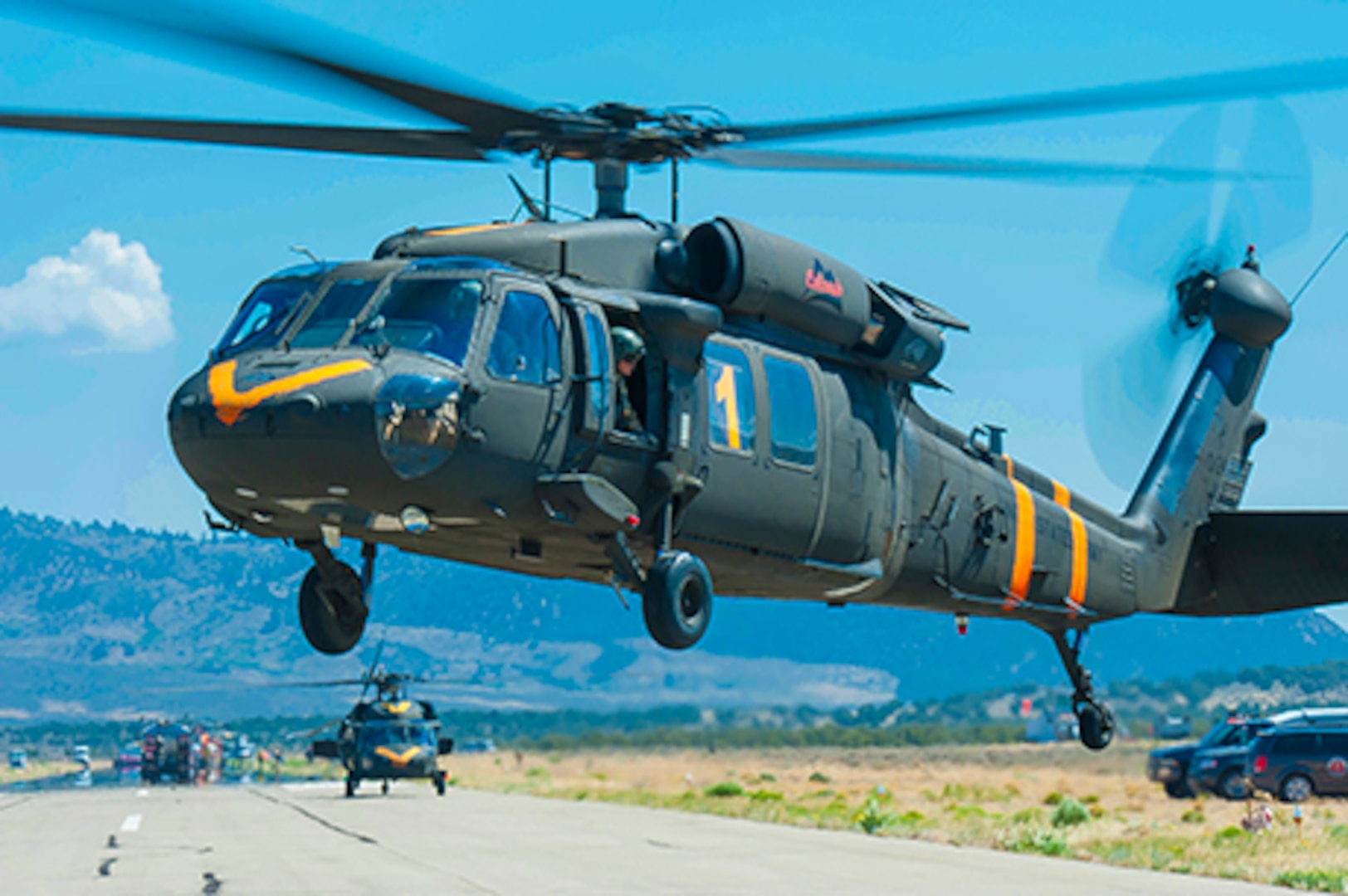 Two UH-60 Black Hawk helicopter crews with aircraft, equipped with aerial water buckets, from the Chief Warrant Officer 5 David R. Carter Army Aviation Support Facility based at Buckley Air Force Base, Aurora, Colorado, depart the Spring Fire helibase, in Fort Garland, Colo., to support fire suppression efforts July 6, 2018. The team arrived and began operations July 2.

The CONG has supported the Spring Fire since July 1, 2018, providing capabilities to include: security personnel for traffic control points and roving patrols; two UH-60 Black Hawk helicopter crews and aircraft each equipped with aerial water buckets; geological information system operators; as well as, refueling crews with Heavy Expanded Mobility Tactical refueling trucks and firefighters with HEMTT firefighting vehicles.

The CONG has been providing an aviation search and rescue standby capability in support of the Rocky Mountain Area Coordination Center since July 1. The High-Altitude Army National Guard Aviation Training Site facility in Gypsum, Colorado, is supporting the mission which is rapid response to aviation search and rescue missions, primarily for firefighter safety, in support of multiple wildfire responses throughout Colorado.

On order of the Governor, the standing Joint Task Force - Centennial commands and integrates CONG forces to support civil authorities in assisting Colorado, or supported states, during times of crisis and disaster, to save lives, prevent suffering, and mitigate great property damage.

(U.S. Air National Guard photo by Tech. Sgt. Nicole Manzanares)