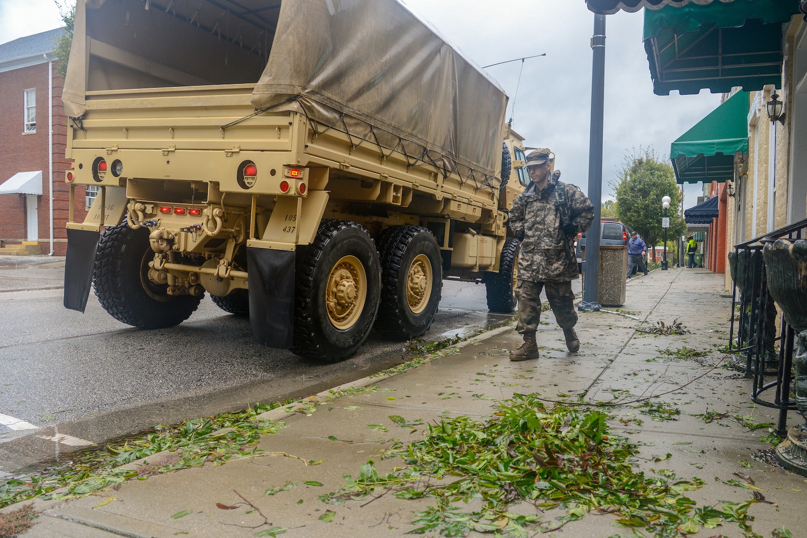 South Carolina National Guard Soldiers and Bennettsville, S.C., law enforcement work together to help the local community evacuate as flooding caused by Tropical Storm Florence forces people from their home, Sept.16, 2018. Approximately 3,400 Soldiers and Airmen have been mobilized to prepare, respond and participate in recovery efforts as Tropical Storm Florence has caused flooding and damage to the state.