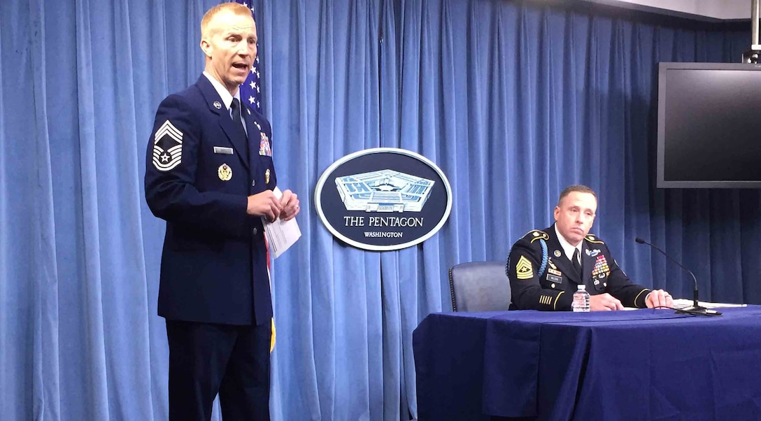 Air Force Chief Master Sgt. Michael D. Noel, left, introduces Army Sgt. Maj. Jason Wilson, right, who spoke about the Close-Combat Lethality Task Force at the Pentagon.