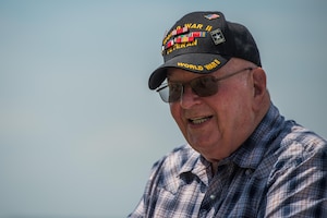 Harrold Helderman, tells a story of his time in the U.S. Army during a tour at Joint Base Langley-Eustis, Virginia, Aug. 8, 2018.