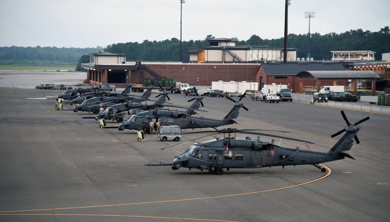 HH-60 Pave Hawk helicopter aircrew Airmen with the 334th Air Expeditionary Group, sit alert on the Joint Base Charleston, S.C., flightline Sept. 16, 2018. The 334th AEG is comprised of Airmen and assets from the 920th Rescue Wing (Patrick Air Force Base, Florida) and the 23d Wing (Moody Air Force Base, Georgia) which stand ready to provide search-and-rescue relief efforts in South Carolina to execute search and rescue operations for those who may be impacted by Hurricane Florence.