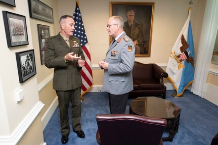 Marine Corps Gen. Joe Dunford, chairman of the Joint Chiefs of Staff, gives German Inspector Gen. Eberhard Zorn, chief of staff of the Federal Armed Forces, a tour of his office at the Pentagon during a counterpart visit, Sept. 29, 2018.