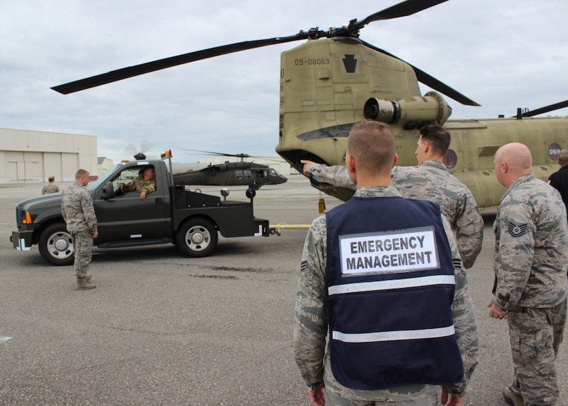 Members of Joint Base Charleston help direct a Pennsylvania Army National Guard Helicopter Aquatic Rescue Team CH-47F Chinook as part of a staging effort for Hurricane Florence rescue operations Sept. 14, 2018.
The Pennsylvania National Guard sent a CH-47F Chinook and UH-60 Blackhawks to Charleston together with their flight crews and rescue technicians, to position itself to support the state of South Carolina for rapid helicopter rescue response.