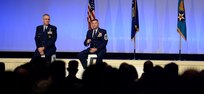 Gen. John Hyten, U.S. Strategic Command commander, and Chief Master Sgt. Patrick F. McMahon, USSTRATCOM senior enlisted leader, speak during a panel at the Air Force Association's Air, Space and Cyber Conference in National Harbor, Md., Sept. 19, 2018. The leaders delivered the USSTRATCOM perspective on multi-domain operations.