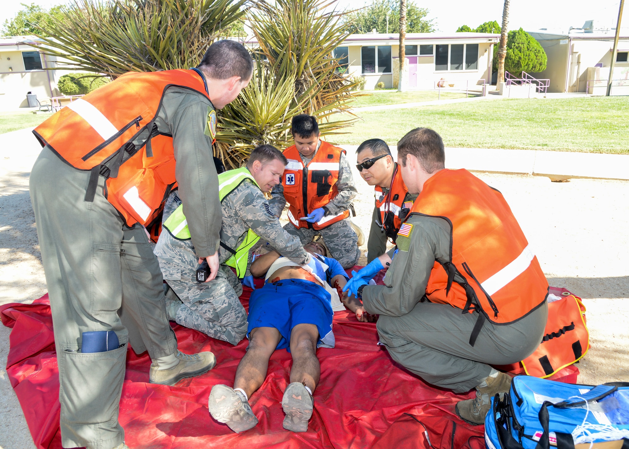 An emergency medical response crew treats a shooting victim during an active shooter scenario exercise at Desert Junior-Senior High School at Edwards Air Force Base, California, Sept. 18, 2018. (U.S. Air Force photo by Giancarlo Casem)