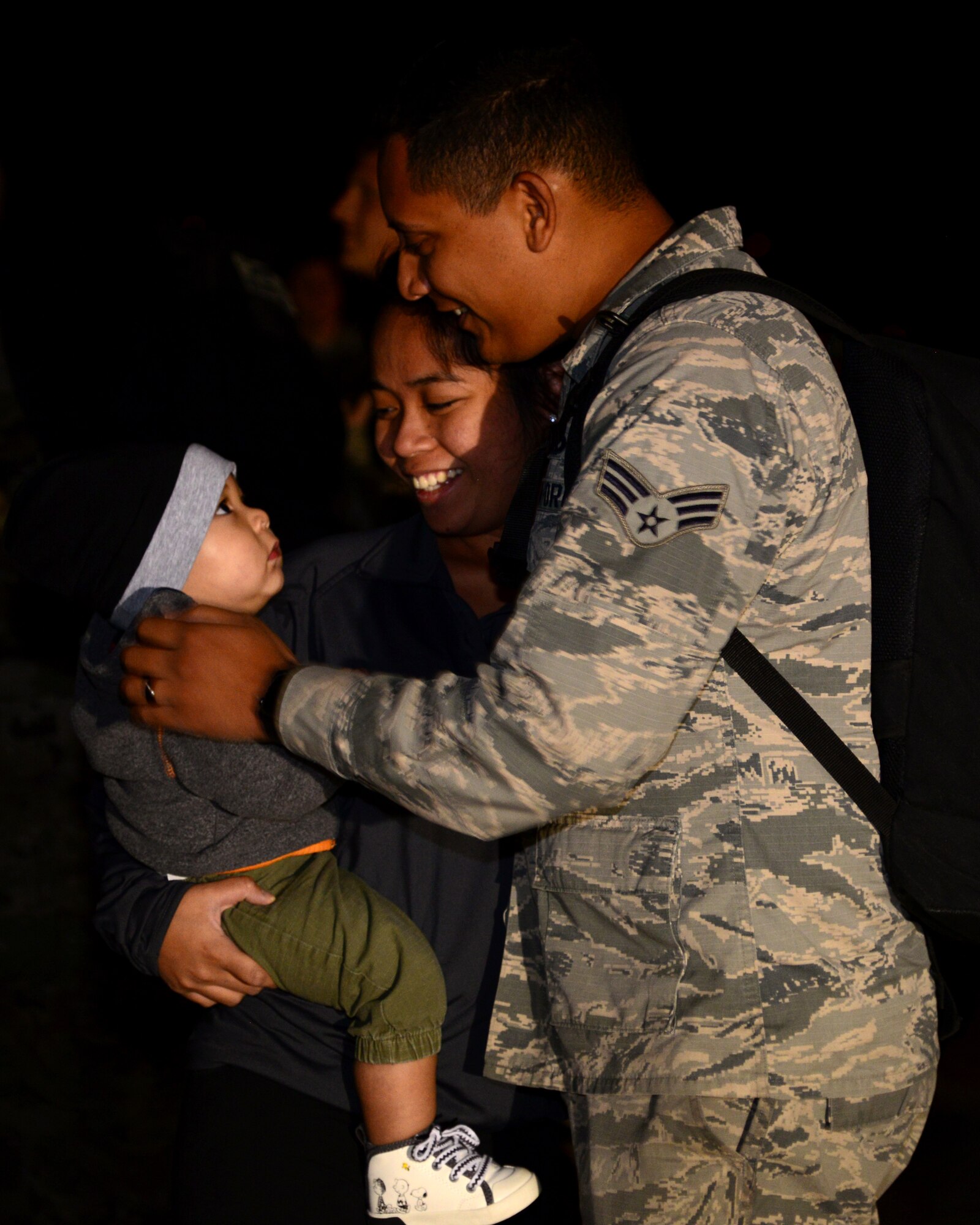 Senior Airman Michael Cardines, a 28th Aircraft Maintenance Squadron aircraft maintenance journeyman, hugs his family after returning home to Ellsworth Air Force Base, S.D., from a six-month deployment to Al Udeid Air Base, Qatar, Sept. 18, 2018. During the deployment, Ellsworth AFB aircrews provided theater commanders with critical long-range strike capability, persistent presence, large diverse weapons payload and organic sensors. (U.S. Air Force photo by Senior Airman Denise M. Jenson)