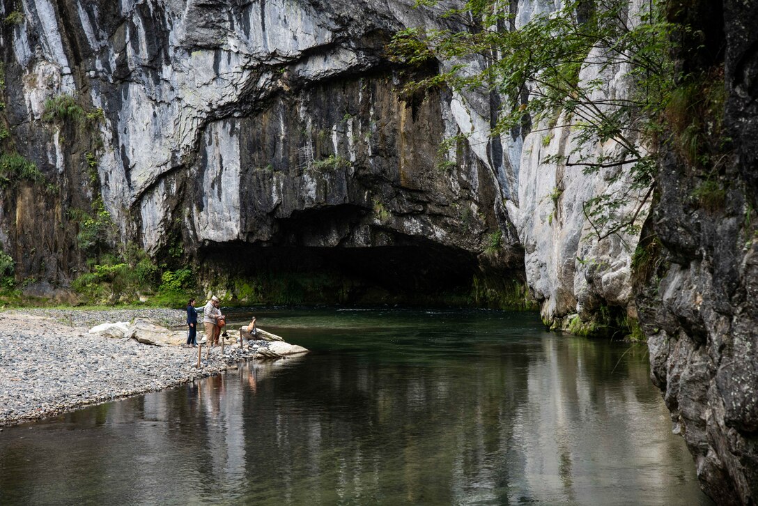 A Japanese family watches peaceful waters at Geibikei Gorge, Ichinoseki, Japan, Sept. 15, 2018. The 35th Fighter Wing chapel gave U.S. service members and their dependents an opportunity to visit some of Japan's historical and natural areas as a part of a resiliency trip in Iwate Prefecture. Approximately 40 Misawa Air Base members went on the tour and enjoyed various items like traditional Japanese food, rock  ormations and historical pieces, dating back to the 1100s. (U.S. Air Force photo by Senior Airman Sadie Colbert)