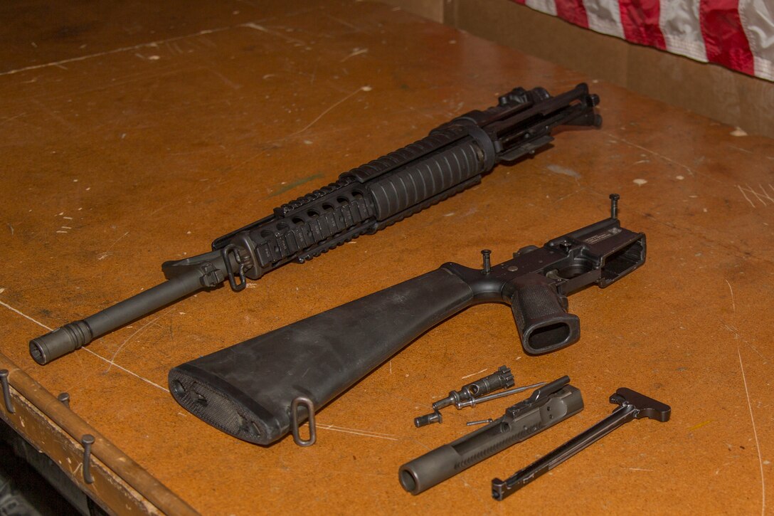 A M16 A4 service rifle is broken down for an inspection and cleaning Aug. 9, 2018 at the Camp Foster armory, Okinawa, Japan.