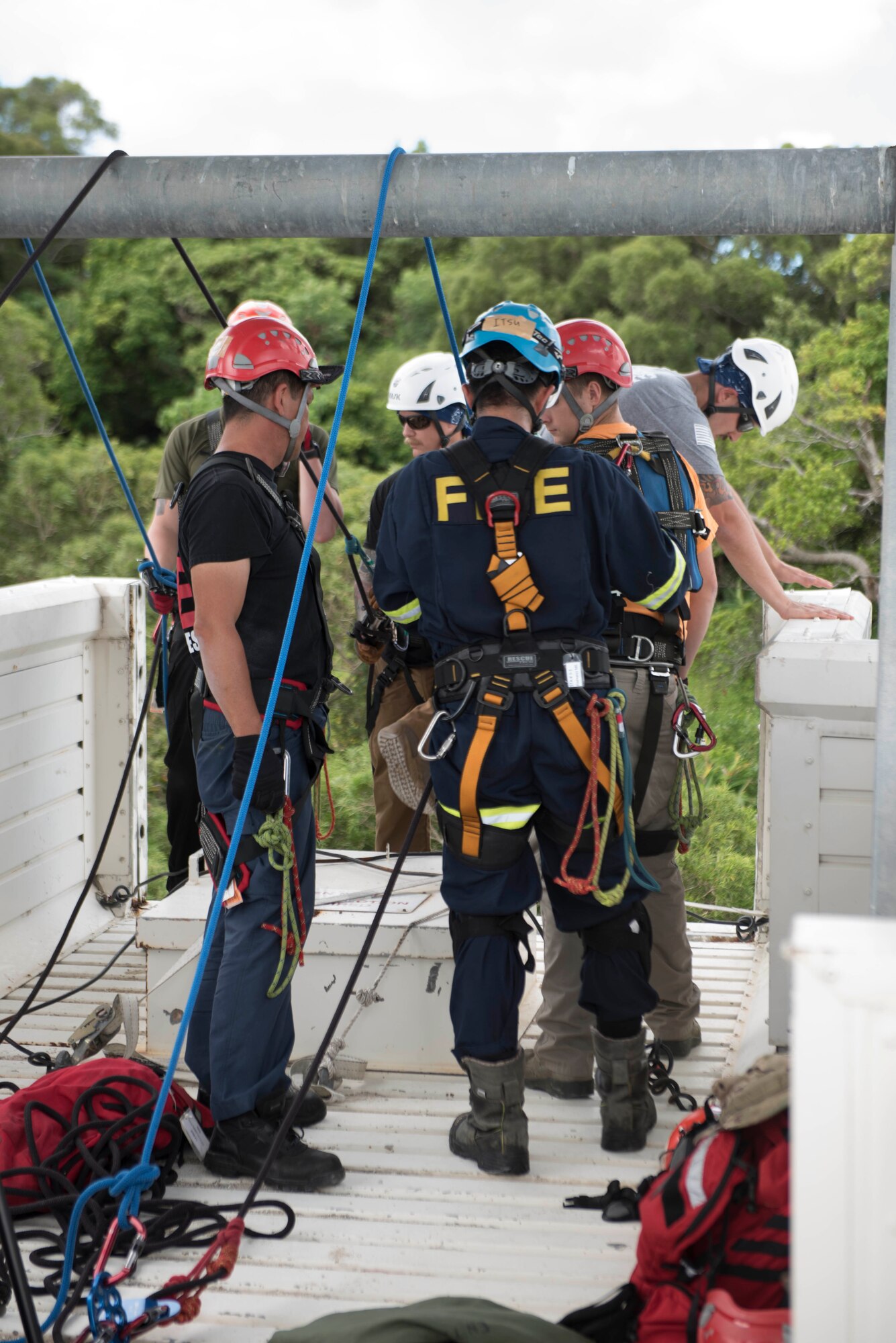 Firefighters from installations across Okinawa participate in rappelling training Sept. 14, 2018, at Kadena Air Base, Japan. Firefighters use rappelling skills in situations requiring access to areas not accessible by foot.