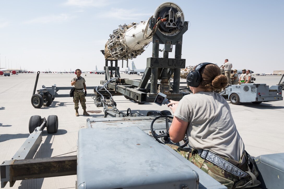 Weapons load crews assigned to the 9th Expeditionary Bomb Squadron conduct a training exercise on the B-1B Lancer with inert munitions at Al Udeid Air Base, Qatar, Sept. 13, 2018. The event involved reconfiguring the aircraft with inert munitions to maintain a high state of readiness. The B-1B Lancer carries the largest conventional payload of both guided and unguided weapons in the Air Force inventory and is the backbone of America's long-range bomber force. It can rapidly deliver massive quantities of precision and non-precision weapons against any adversary, anywhere in the world, at any time. Its armaments include up to 24 AGM-158A Joint Air-to-Surface Standoff Munitions. (U.S. Air Force photo by Tech. Sgt. Ted Nichols/Released)