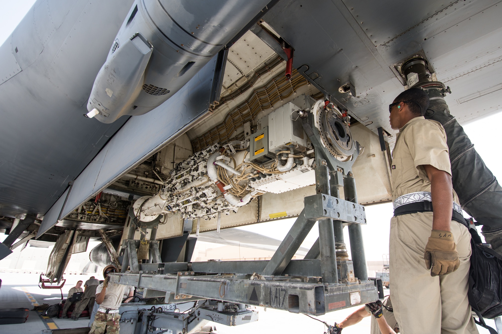 Weapons load crews assigned to the 9th Expeditionary Bomb Squadron conduct a training exercise on the B-1B Lancer with inert munitions at Al Udeid Air Base, Qatar, Sept. 13, 2018. The event involved reconfiguring the aircraft with inert munitions to maintain a high state of readiness. The B-1B Lancer carries the largest conventional payload of both guided and unguided weapons in the Air Force inventory and is the backbone of America's long-range bomber force. It can rapidly deliver massive quantities of precision and non-precision weapons against any adversary, anywhere in the world, at any time. Its armaments include up to 24 AGM-158A Joint Air-to-Surface Standoff Munitions. (U.S. Air Force photo by Tech. Sgt. Ted Nichols/Released)