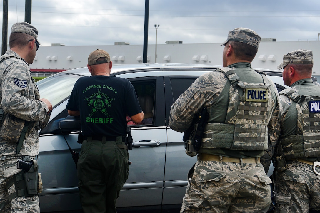 Air Force airmen support Florence County Sheriff’s Department with traffic control and evacuation efforts.