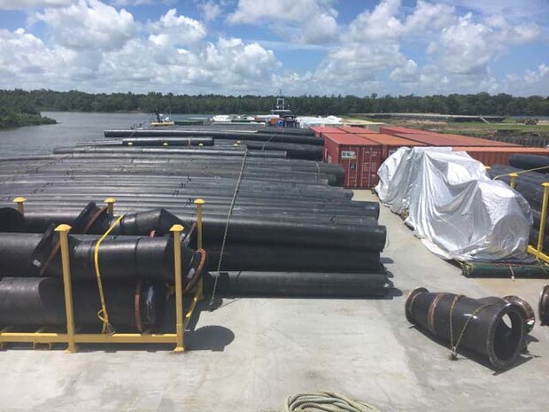 Donjon's barge loaded with piping, CONEX boxes, pumps and spare parts prior to sailing from Morgan City, LA